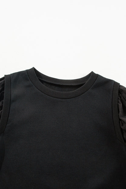 Zwart getextureerd sweatshirt met ronde hals en patchwork