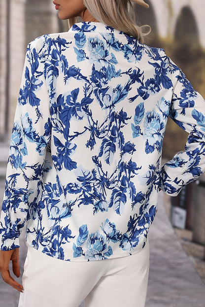 Hemelblauwe bloemenprint gekotte nek elegante blouse
