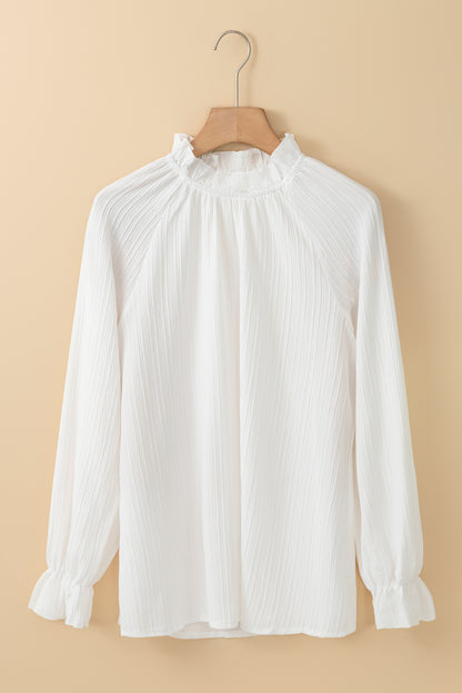 Witte blouse met ruches en rimpelige bubbelmouwen met ruches