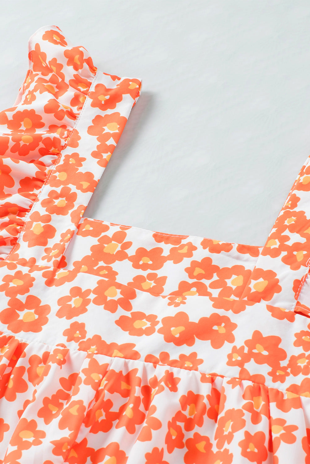 Oranje tanktop met ruches met vierkante hals en bloemenprint