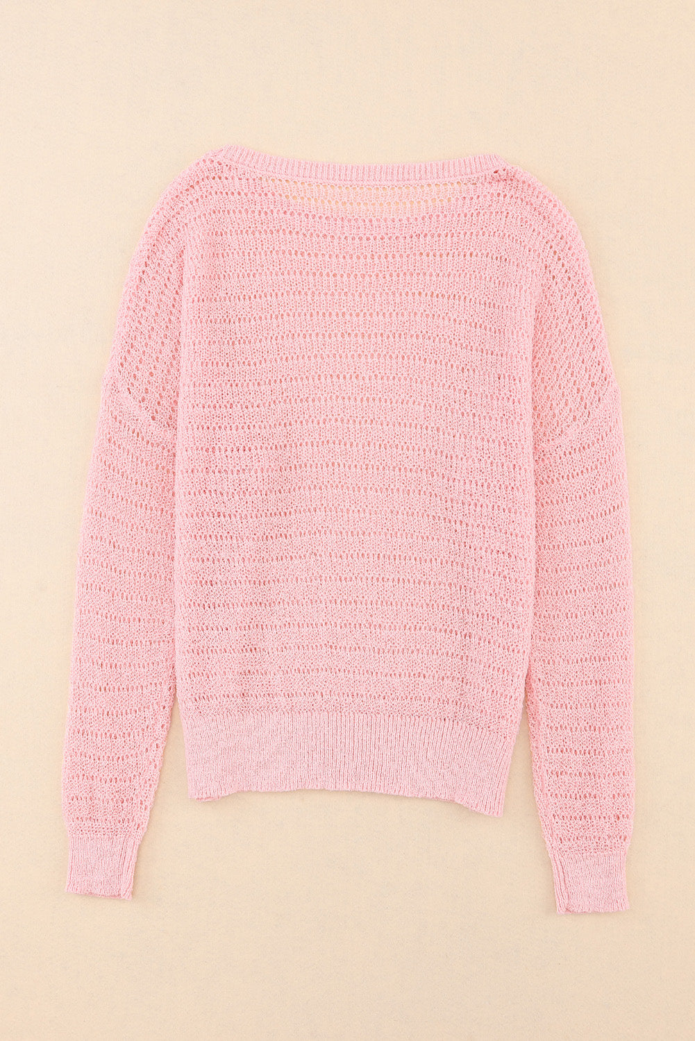 Roze gebreide top met ronde hals en lange mouwen