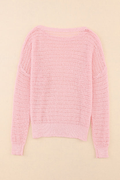 Roze gebreide top met ronde hals en lange mouwen