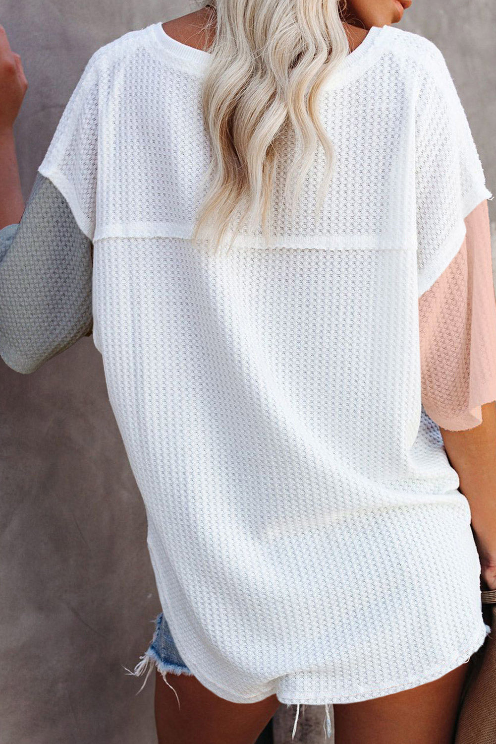 Oversized top met veelkleurige wafelkleurblokken en wijde mouwen