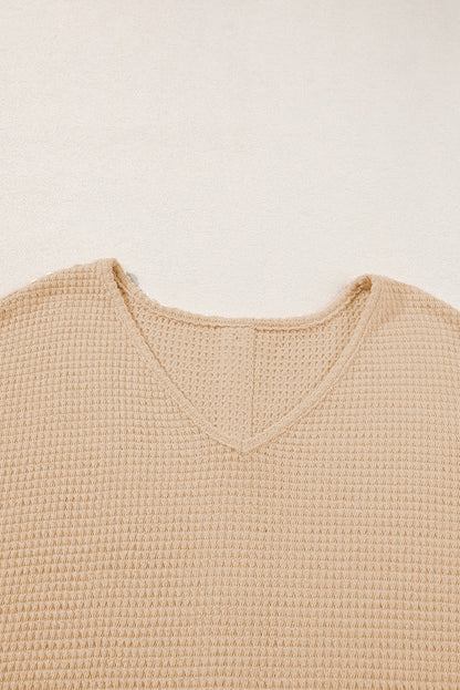 Havermout getextureerd T-shirt met knoopsluiting aan de achterkant en manchetten