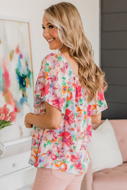 Veelkleurige aquarel bloemen blouse met vierkante hals en ruches aan de mouwen