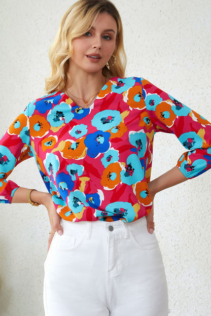 Roze veelkleurige blouse met V-hals en 3/4 mouwen met bloemenprint