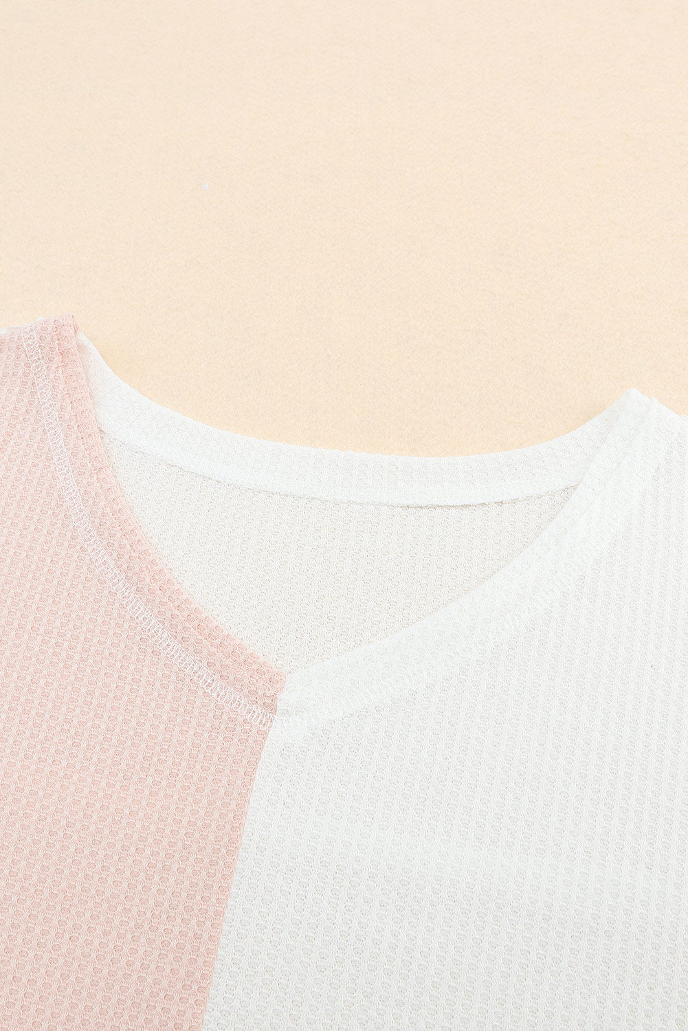 Oversized top met veelkleurige wafelkleurblokken en wijde mouwen