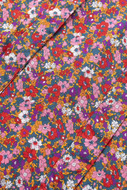 Paarse bloemenprint geknoopte blouse met hoge hals en pofmouwen