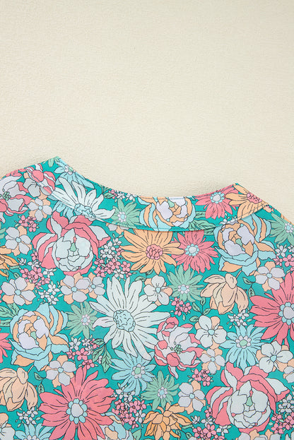 Veelkleurige bloemenblouse met ingekeepte hals en korte mouwen