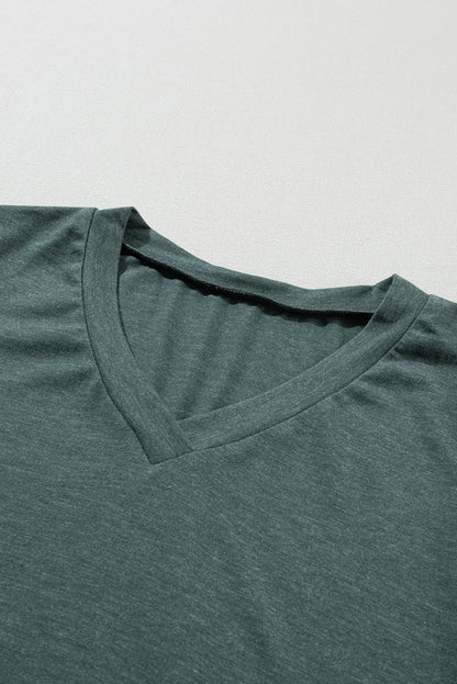 Mistgroen mode T-shirt met V-hals en bloemmouwen
