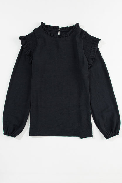 Zwarte blouse met ruches en ruches en bubbelmouwen
