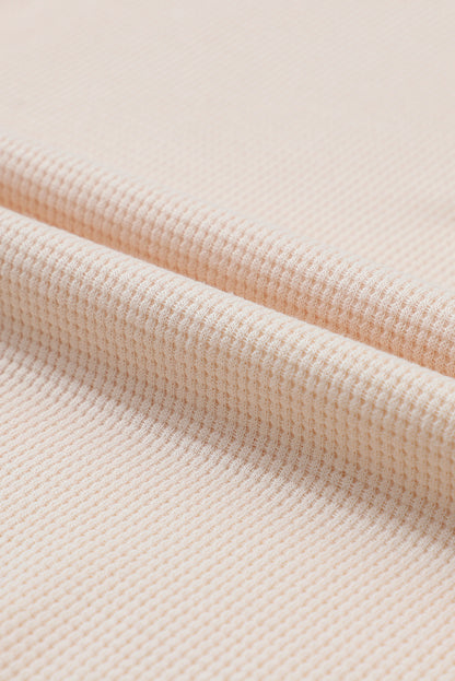 Beige wafelgebreide Henley-top met textuur