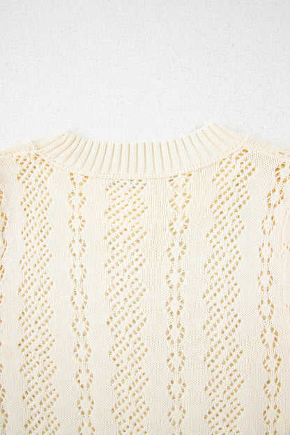 Beige uitgehold patroon gebreide korte puff mouw trui