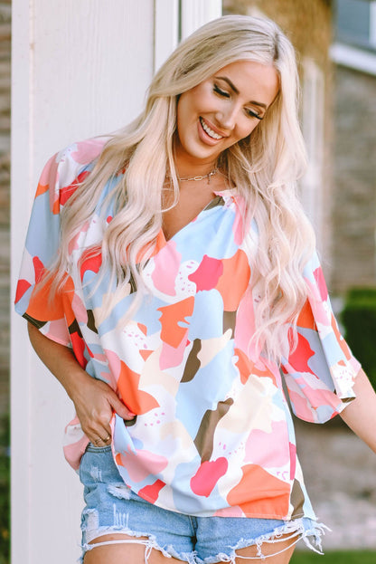 Blouse met veelkleurige bloemenprint, V-hals en halve mouw