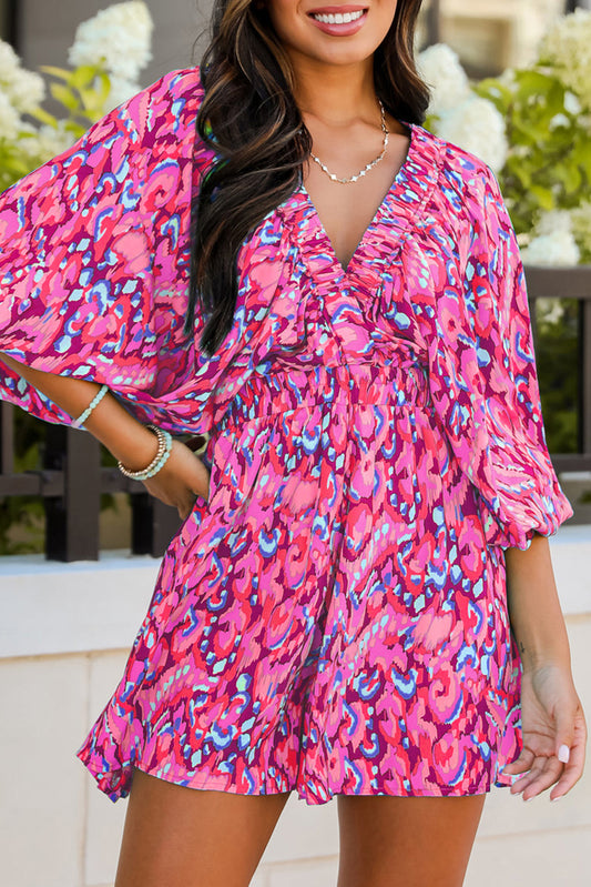 Roze abstracte print puff mouw v nek hoge taille romper