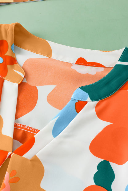 Oranje bloemen getande blouse met V-hals en ruches aan de mouwen