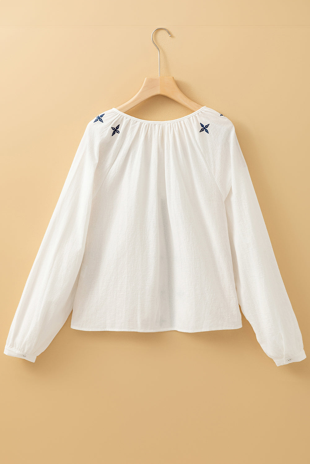 Wit geometrische geborduurde blouse met lange mouwen met knoop