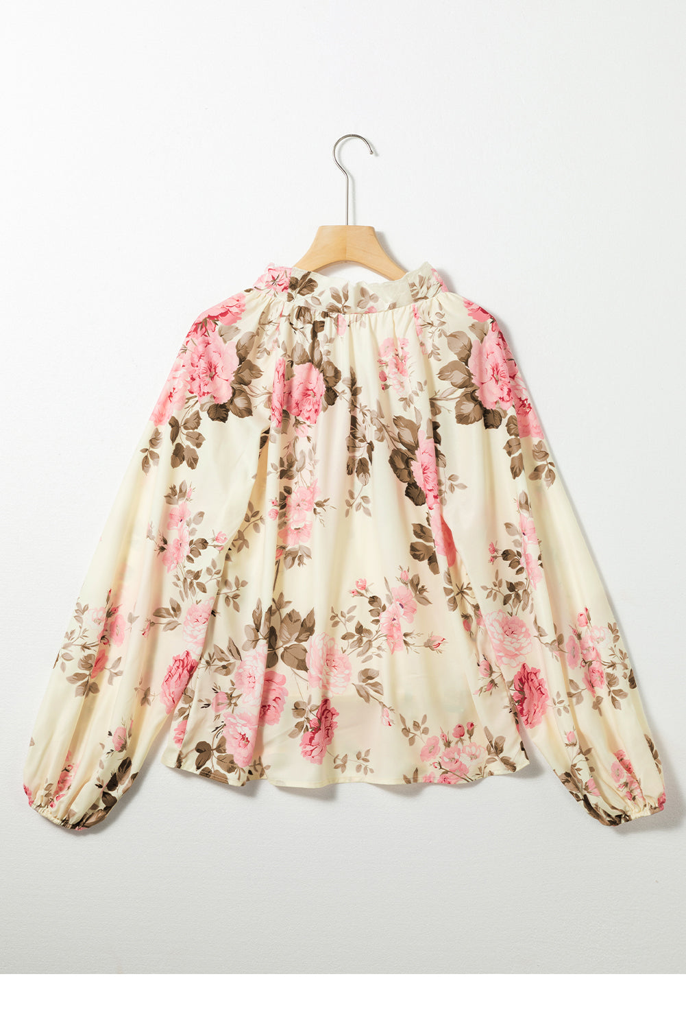 Beige blouse met V-hals met bloemenprint en lantaarnmouwen