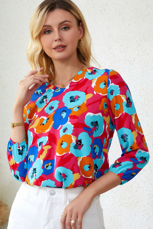 Roze veelkleurige blouse met V-hals en 3/4 mouwen met bloemenprint
