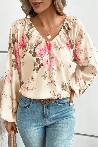 Beige blouse met V-hals met bloemenprint en lantaarnmouwen