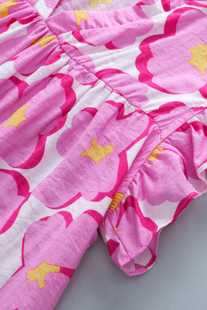 Babydoll-blouse met roze bloemen en ruches aan de mouwen