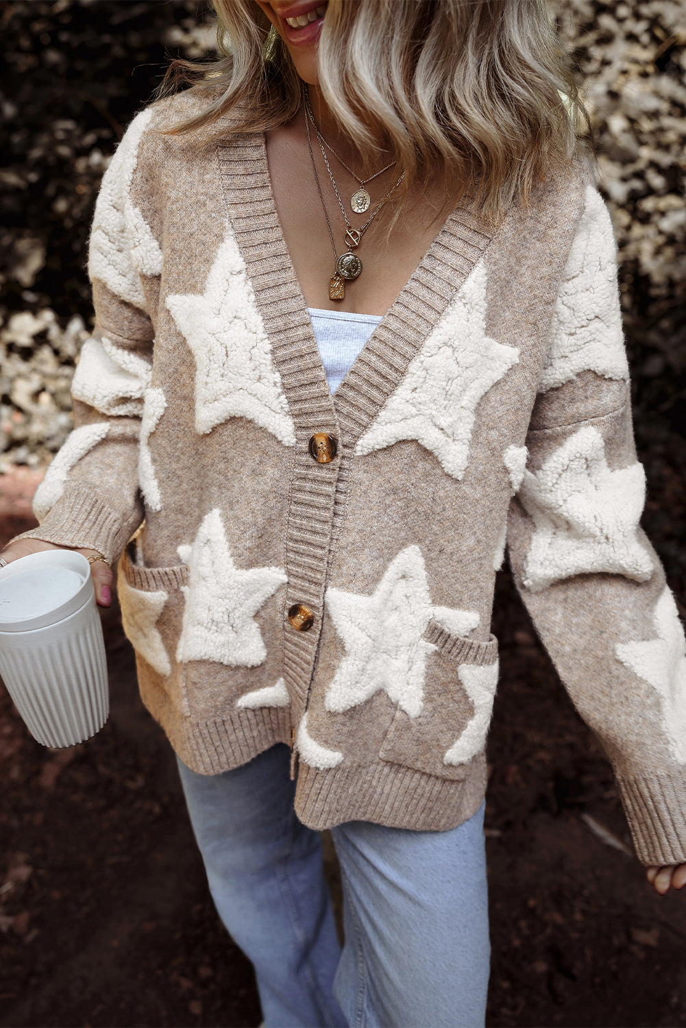 Kaki vest met sherpa-sweater met sterrenpatroon en zakken