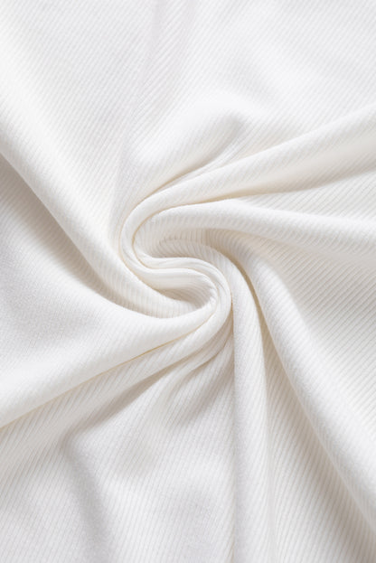 Witte contrasterende tweed top met pofmouwen