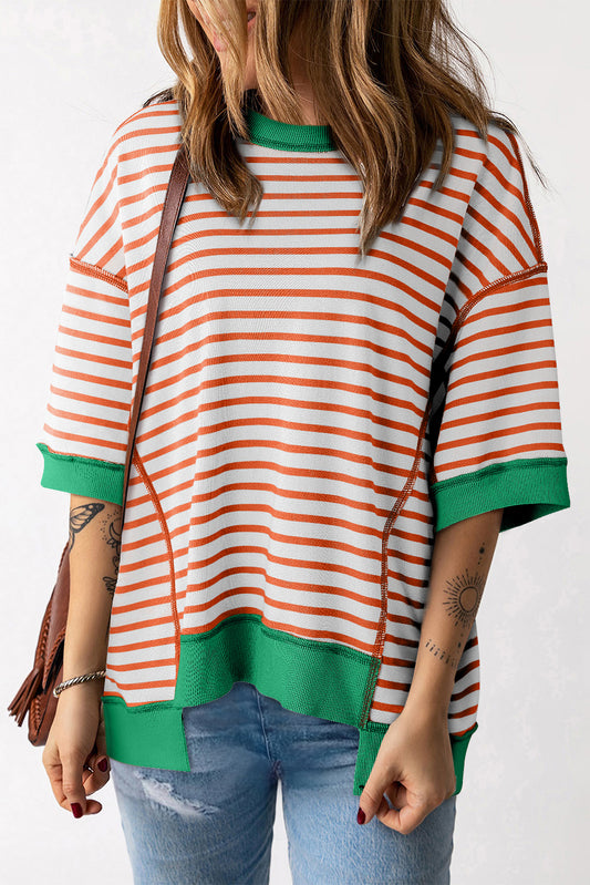 Oranje gestreept oversized contrasterende rand met zichtbare naad, hoog laag T-shirt