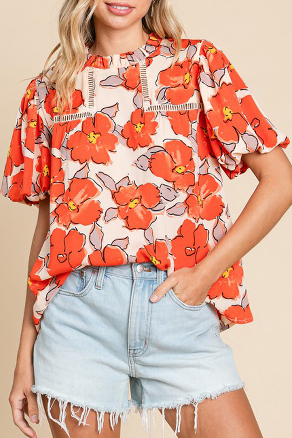 Oranje bloemen losse blouse met bubbelmouwen en ruches aan de hals