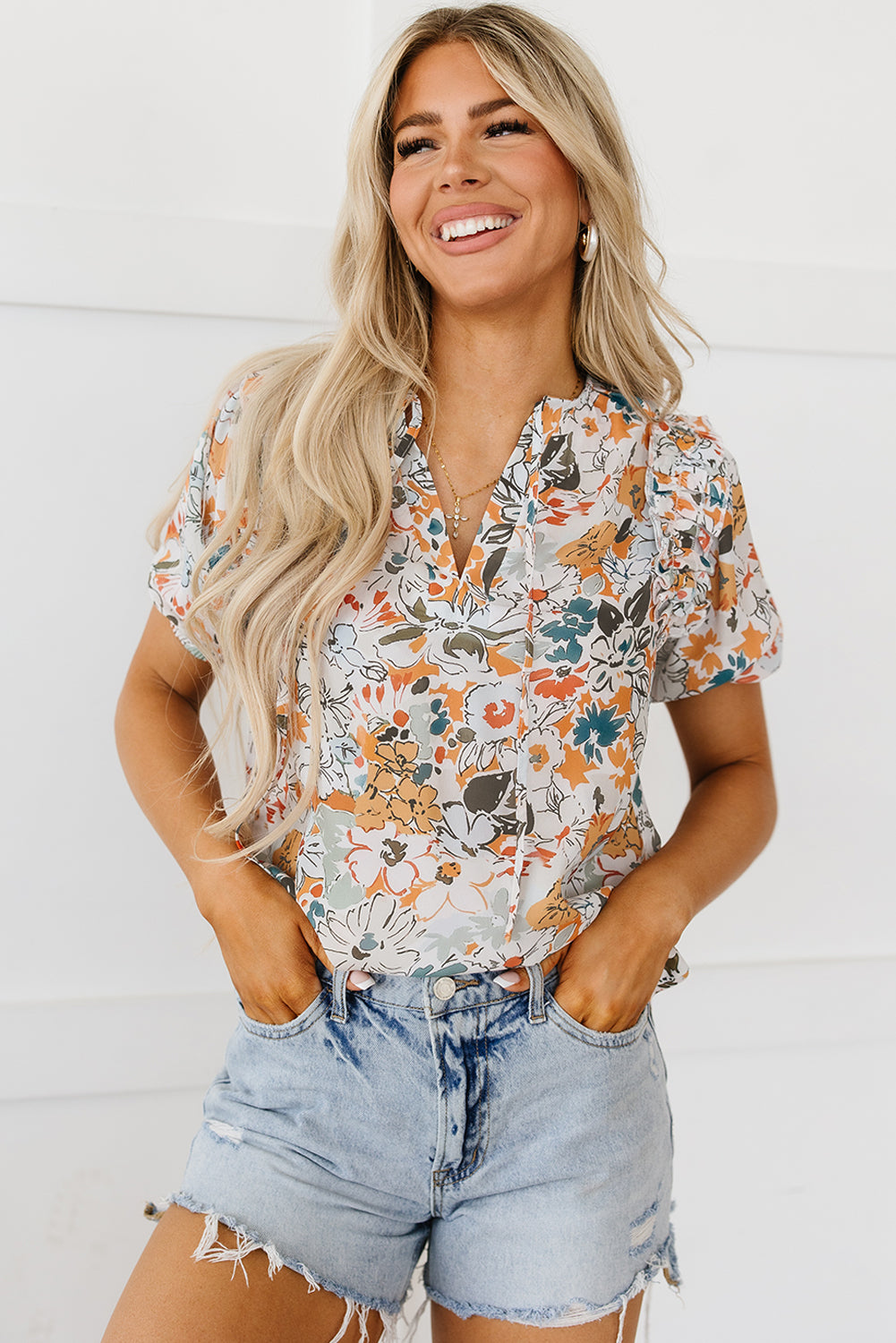 Veelkleurige blouse met split en V-hals, pofmouwen en bloemenprint