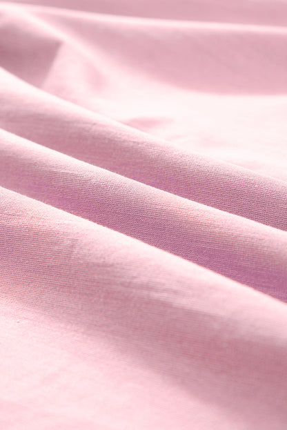 Roze bloemen geborduurde blouse met split aan de hals en pofmouwen