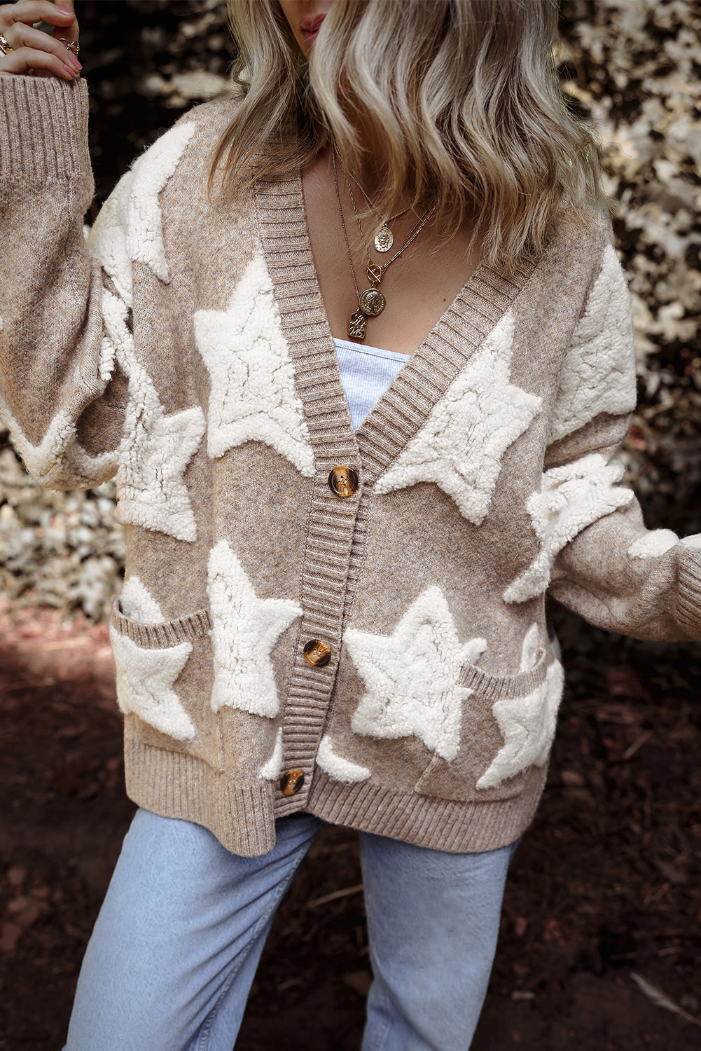 Kaki vest met sherpa-sweater met sterrenpatroon en zakken