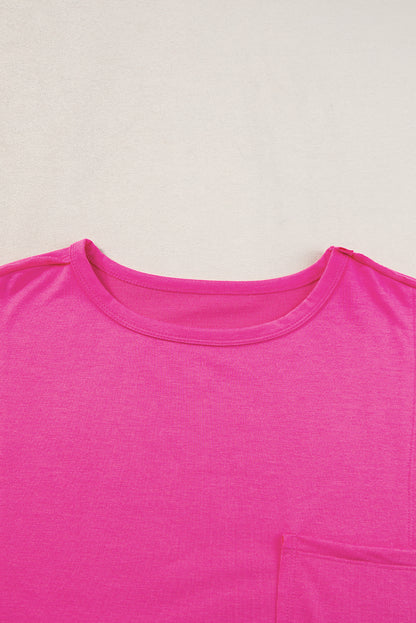 Felroze oversized T-shirt met opgestikte zak en zichtbare naad