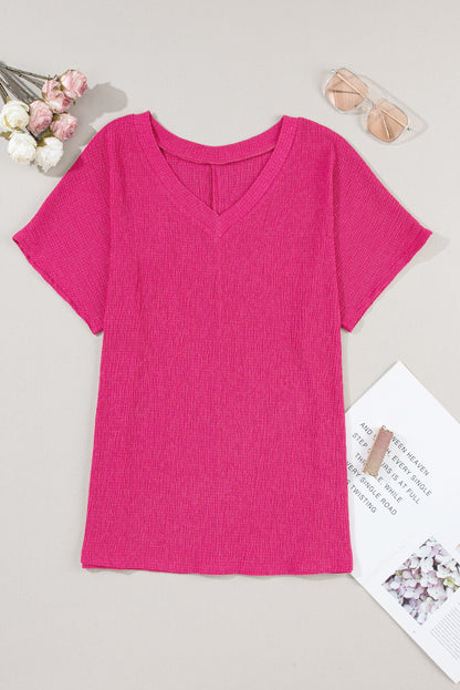 Felroze gerimpeld T-shirt met V-hals en wijde mouwen