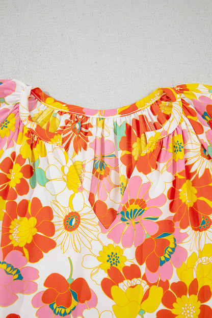 Oranje blouse met abstracte print en V-hals en halve mouw