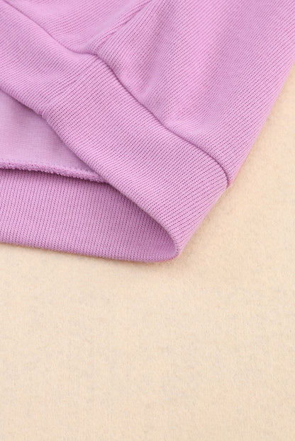 Paarse gebreide blouse met V-hals en knoopmanchetten