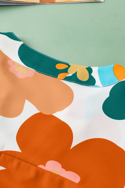 Oranje bloemen getande blouse met V-hals en ruches aan de mouwen