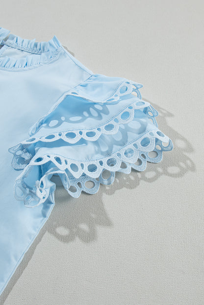 Beau blauwe gelaagde Ric Rac-blouse met kapmouwen en gevulde nek