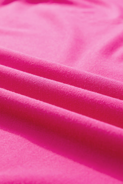 Felroze oversized T-shirt met opgestikte zak en zichtbare naad