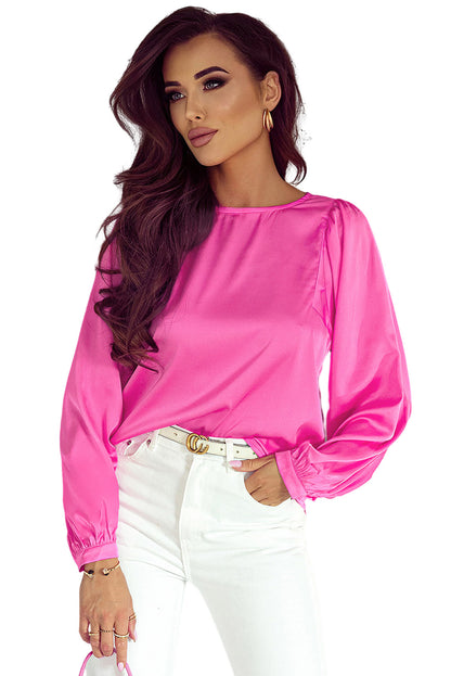 Roze satijnen blouse met ronde hals en lange mouwen