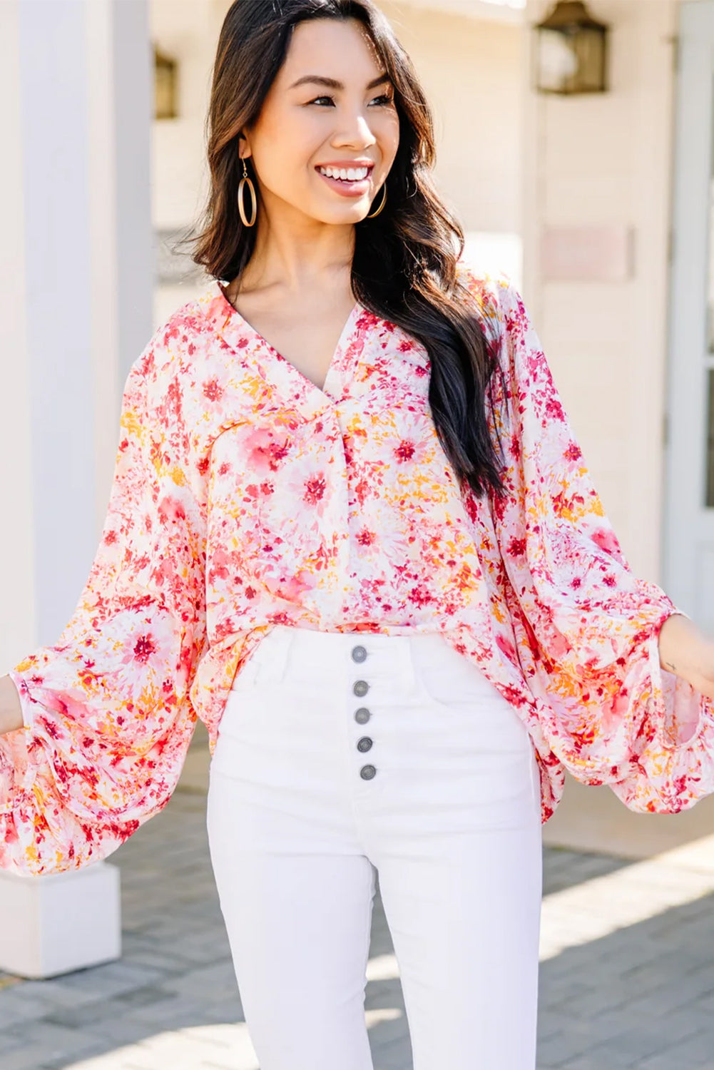 Roze, met bloemen bedrukte blouse met V-hals en bubbelmouwen