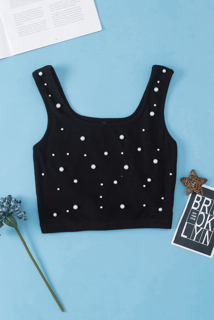 Mouwloze crop top met zwarte pareldecor en vierkante hals