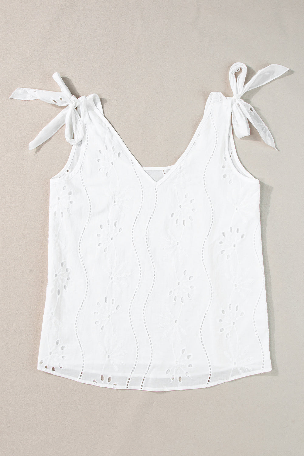 Witte tanktop met geknoopte bandjes en V-hals met borduurmotief