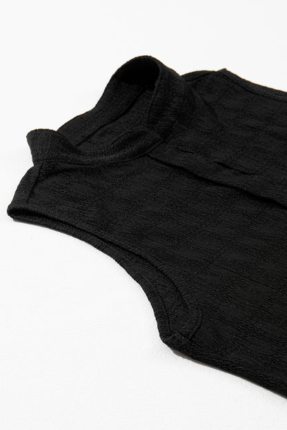 Zwarte tanktop met splithals en traliestructuur