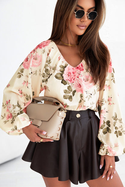 Beige blouse met V-hals met bloemenprint en lantaarnmouwen