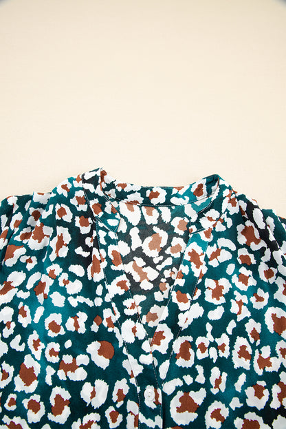 Blauwe overhemdjurk met ruches en luipaardprint met bubbelmouwen