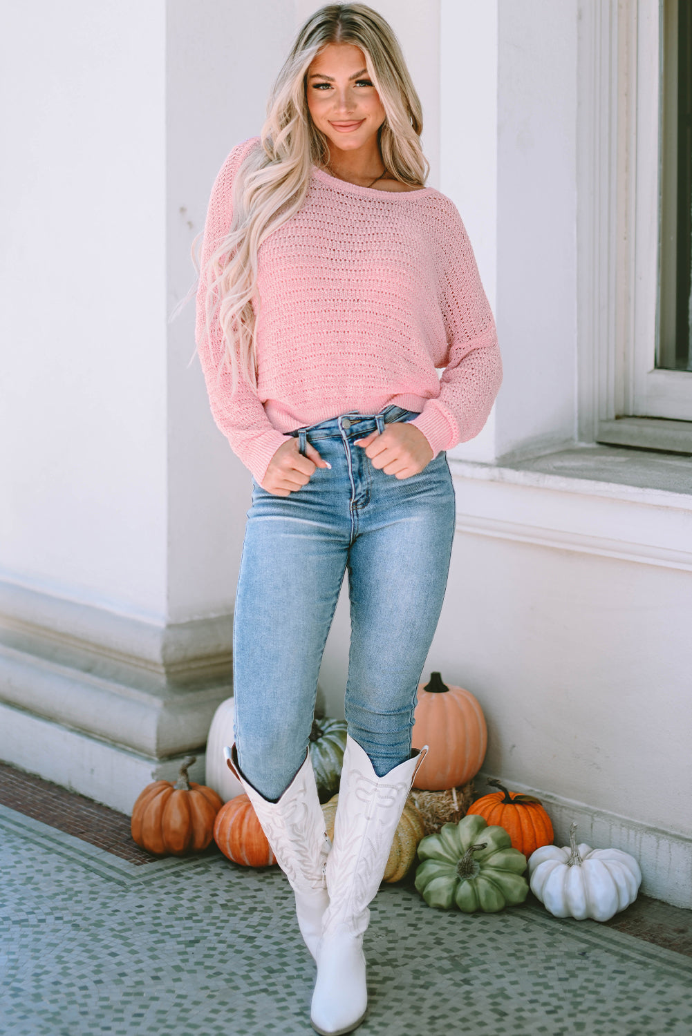 Roze gebreide top met ronde hals en lange mouwen