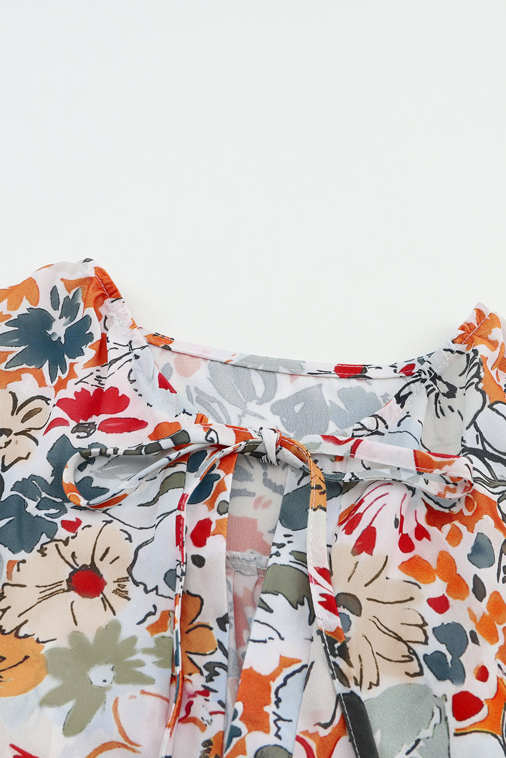 Veelkleurige blouse met split en V-hals, pofmouwen en bloemenprint