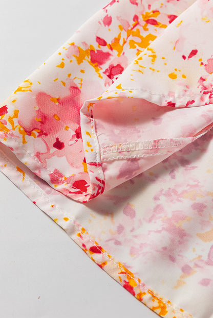 Roze, met bloemen bedrukte blouse met V-hals en bubbelmouwen