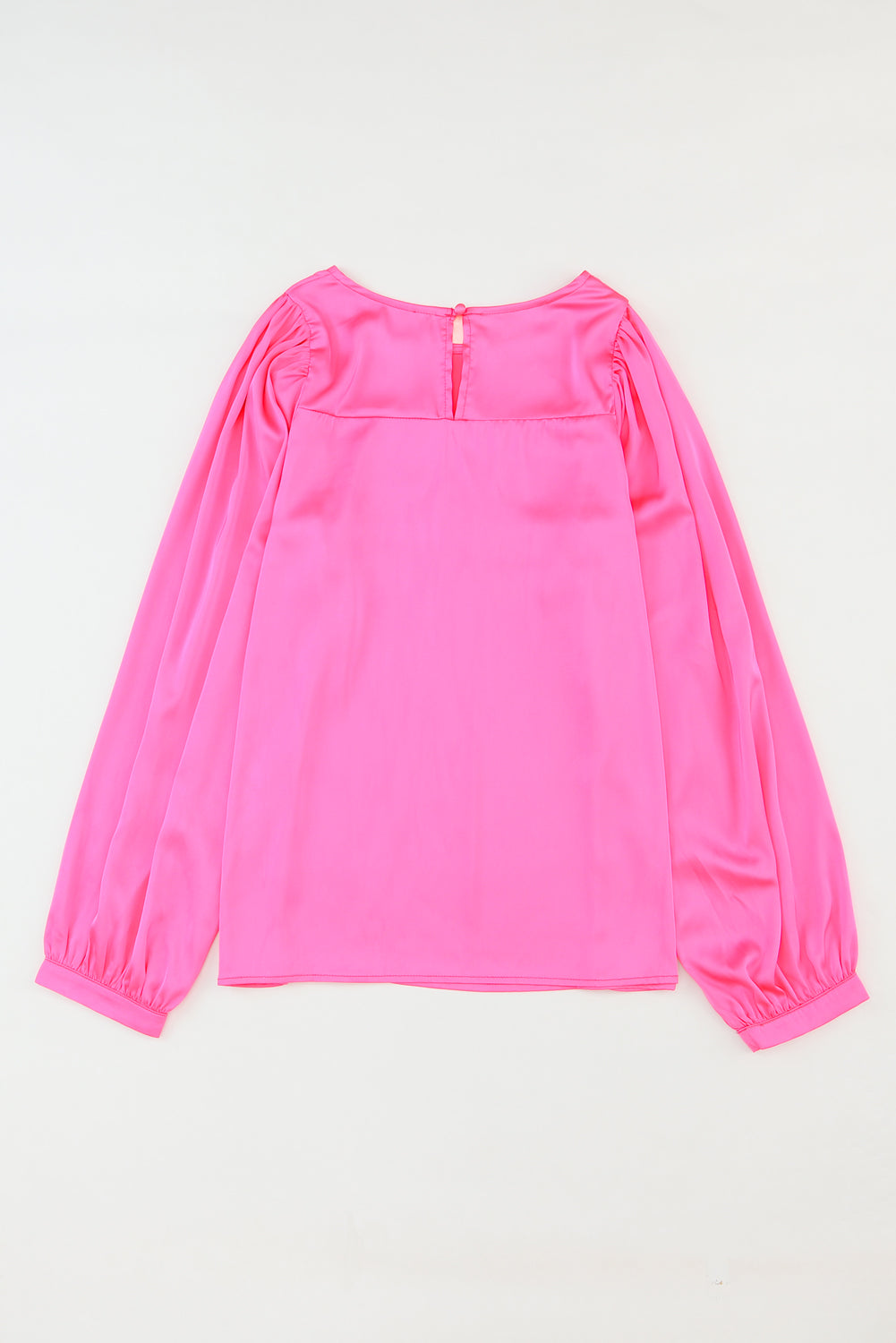 Roze satijnen blouse met ronde hals en lange mouwen